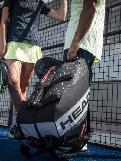 Padel centre tennis bag, tennis racquet, sports gear, paddel tennis, Auckland New Zealand, sports equipment, tennis players, outdoor sports gear, tennis court accessories, padel tennis gear, Auckland sports facilities.